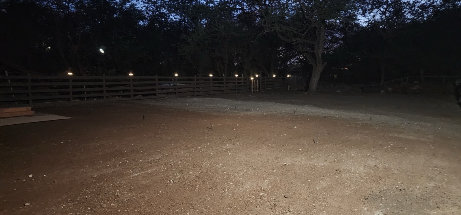 New farm fence along the side of the property